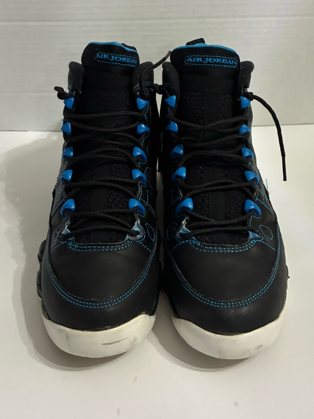Jordan Black Sneakers with Bright Blue Accents